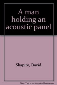 A man holding an acoustic panel