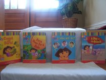 Dora the Explorer: Dora's Box of Books (A Day at the Beach, Dora's Opposites, Count With Dora, A Surprise Party) (English and Spanish Edition)