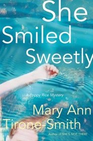 She Smiled Sweetly : A Poppy Rice Mystery