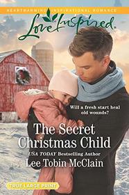 The Secret Christmas Child (Rescue Haven, Bk 1) (Love Inspired, No 1252) (True Large Print)