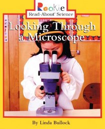 Looking Through A Microscope (Turtleback School & Library Binding Edition) (Rookie Read-About Science (Prebound))