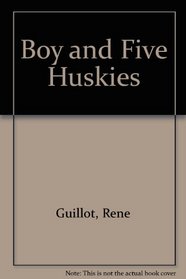Boy and Five Huskies