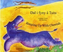 Keeping Up with Cheetah in Welsh and English (English and Welsh Edition)