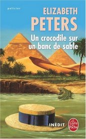 Un crocodile sur un banc de sable