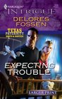 Expecting Trouble (Larger Print Harlequin Intrigue: Texas Paternity Boots & Booties)