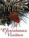A Christmas Visitor (Thorndike Press Large Print Basic Series)