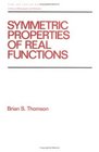 Symmetric Properties of Real Functions