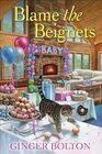 Blame the Beignets (A Deputy Donut Mystery)