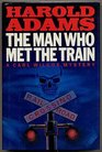 Man Who Met the Train: A Carl Wilcox Mystery