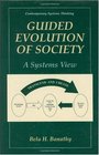 Guided Evolution of Society A Systems View