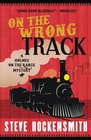 On the Wrong Track: A Holmes on the Range Mystery (Holmes on the Range Mysteries) (Volume 2)
