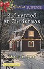 Kidnapped at Christmas (True North Bodyguards, Bk 1) (Love Inspired Suspense, No 565) (Larger Print)