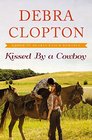 Kissed by a Cowboy (Four of Hearts Ranch, Bk 3)