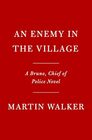 An Enemy in the Village: A Bruno, Chief of Police Novel (Bruno, Chief of Police Series)