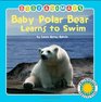 Baby Polar Bear Learns To Swim