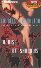 A Kiss of Shadows (Meredith Gentry, Bk 1) (Abridged Audio Cassette)