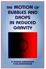 The Motion of Bubbles and Drops in Reduced Gravity
