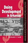 DOING DEVELOPMENT IN ARKANSAS USING CREDIT TO CREATE OPPORTUNITY