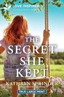 The Secret She Kept