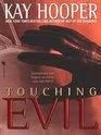 Touching Evil (Thorndike Press Large Print Americana Series)